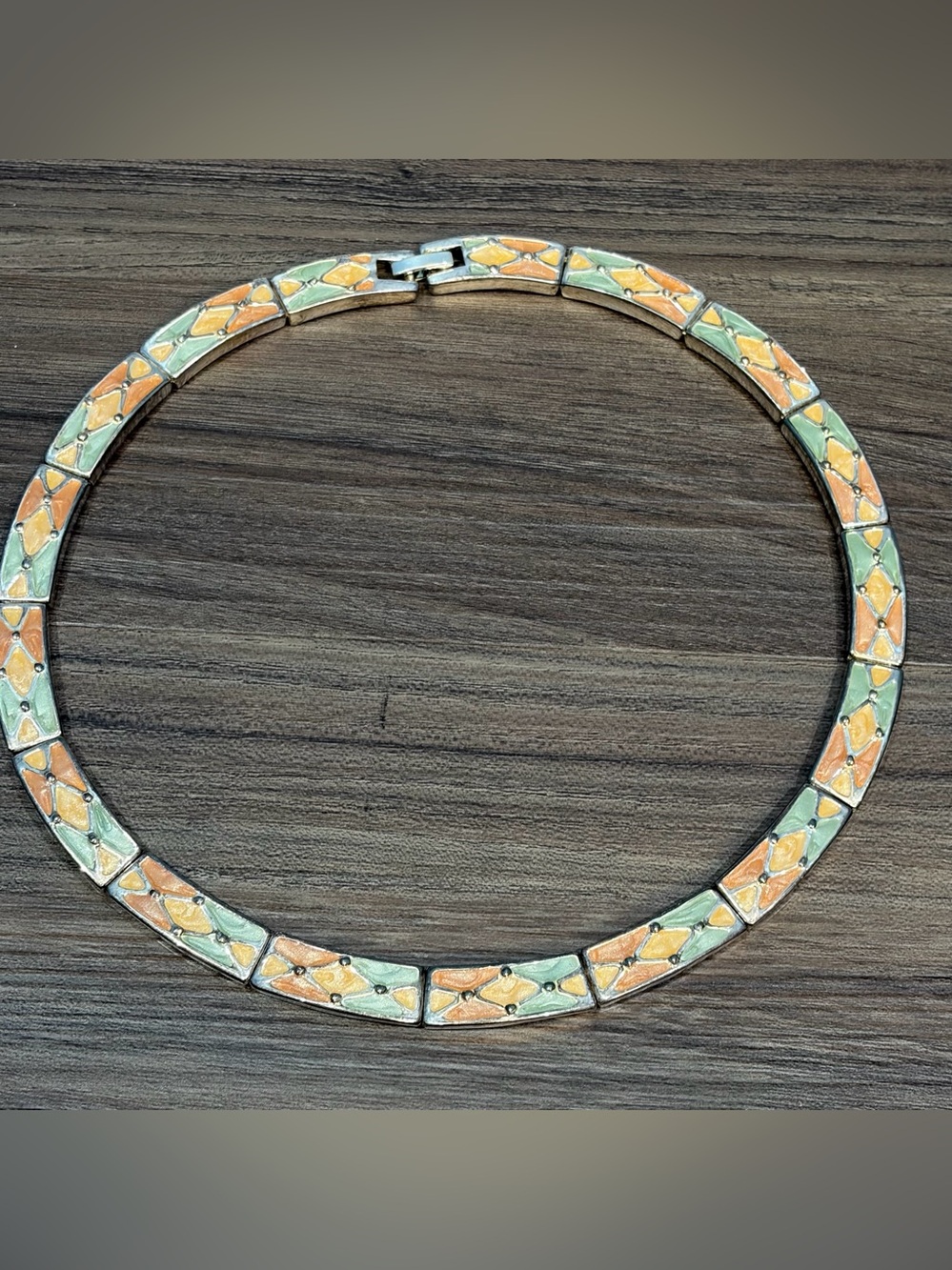 This is a really fun vintage harlequin geometric link choker necklace with fold